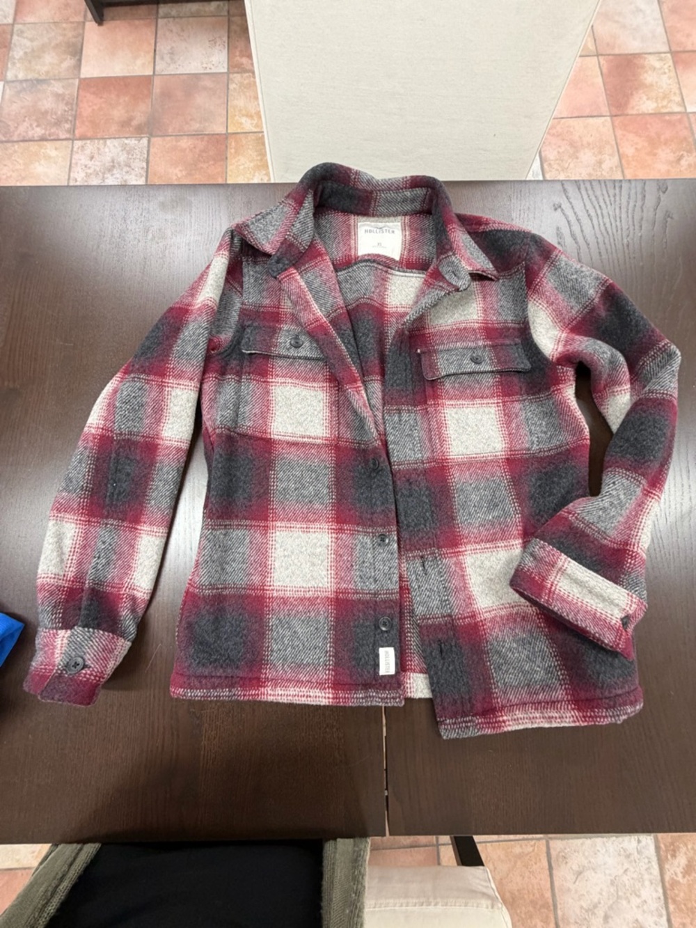 One extra small men’s button up plaid flannel jacket